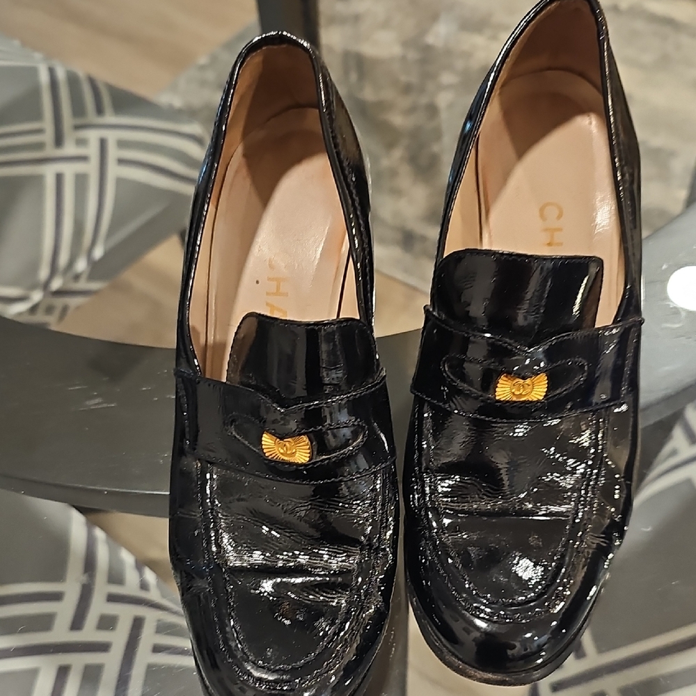 CHANEL Glossy Black Loafers with Gold Detail